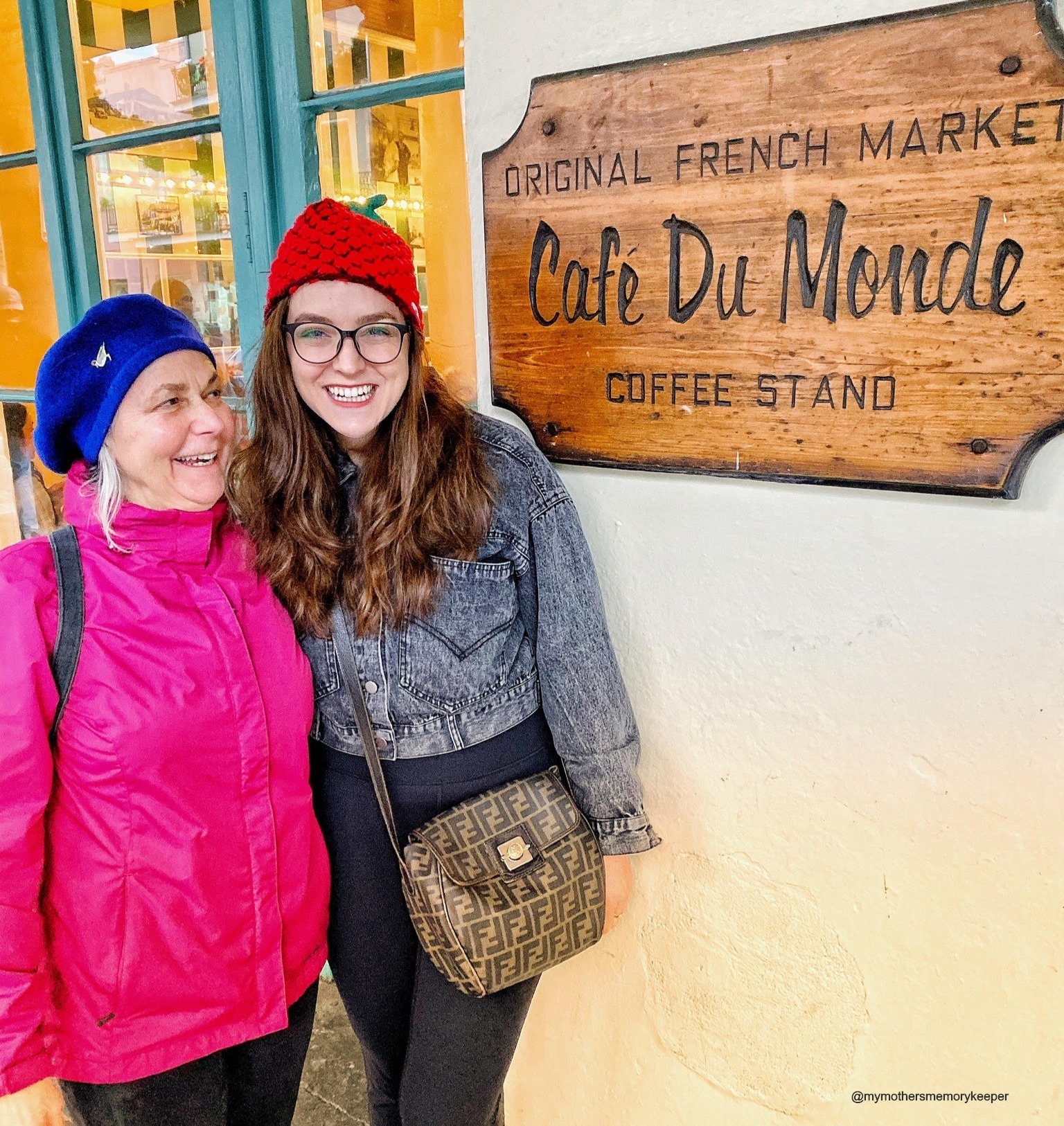 Torin and mother in front of coffee shop